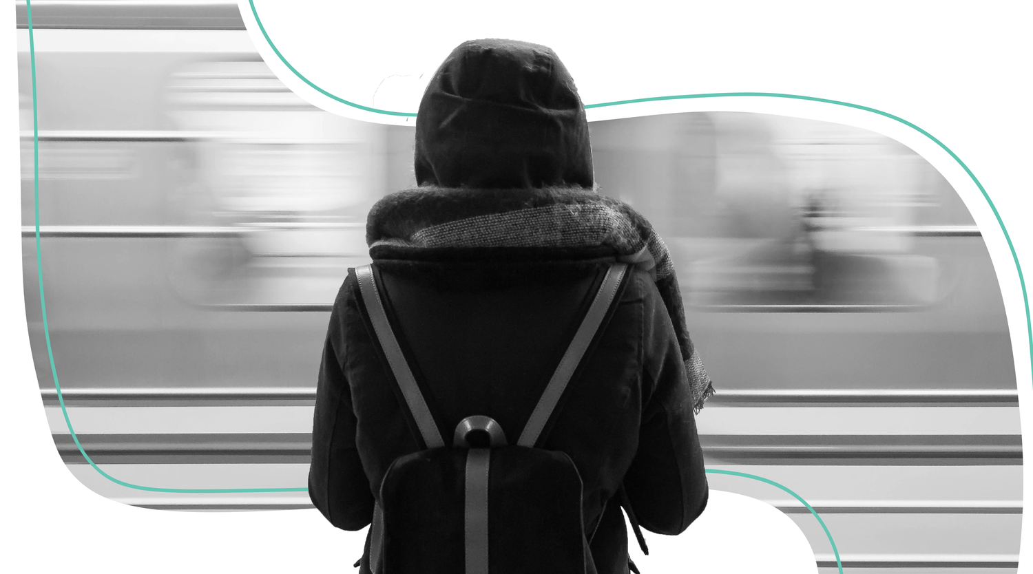 women with her back turned waiting for the train in black and white