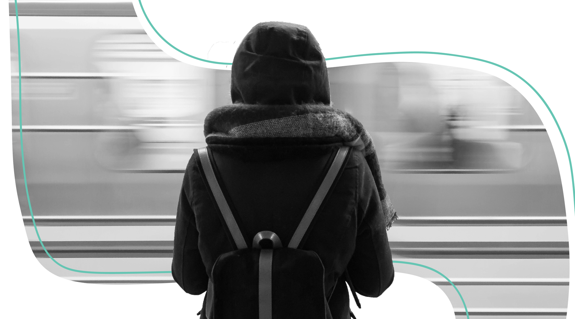 women with her back turned waiting for the train in black and white