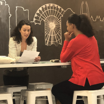 CEO of Career Organic coaching a client.