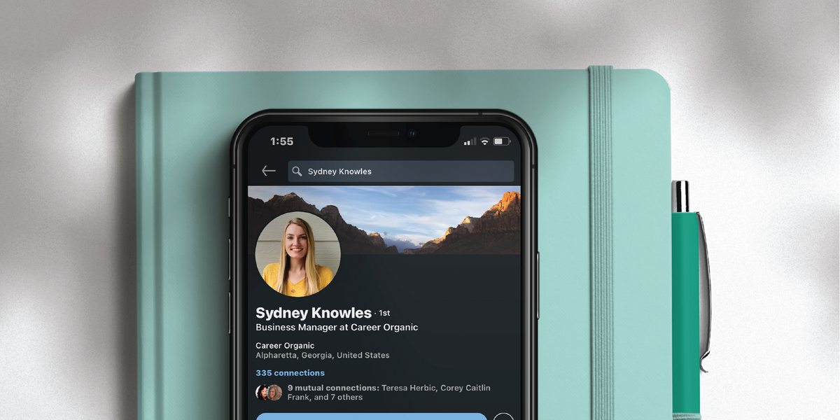 A phone with a LinkedIn description created by CareerOrganic.com