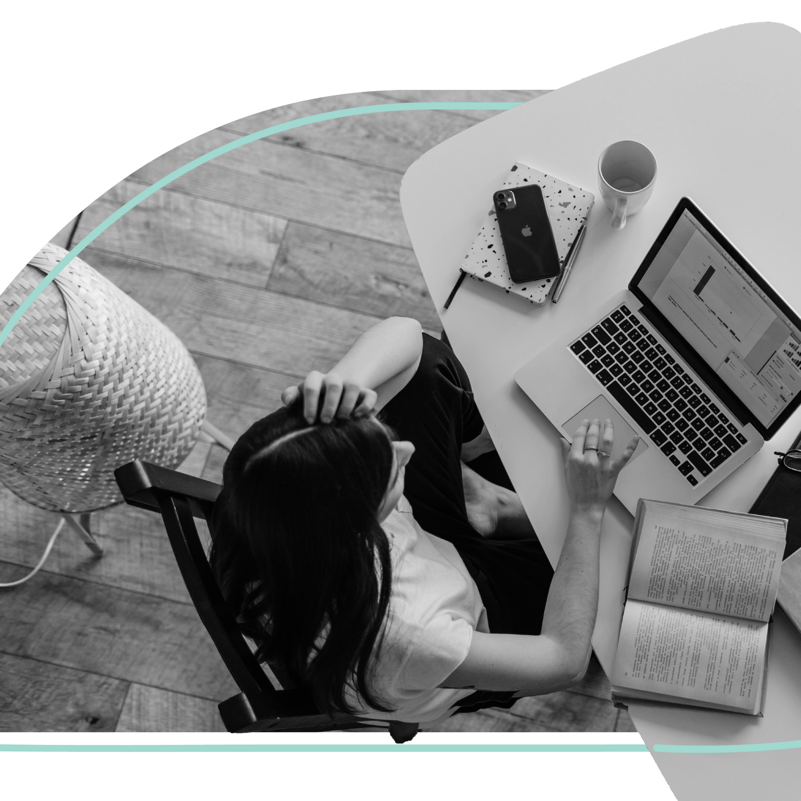 women at desk on her computer working 