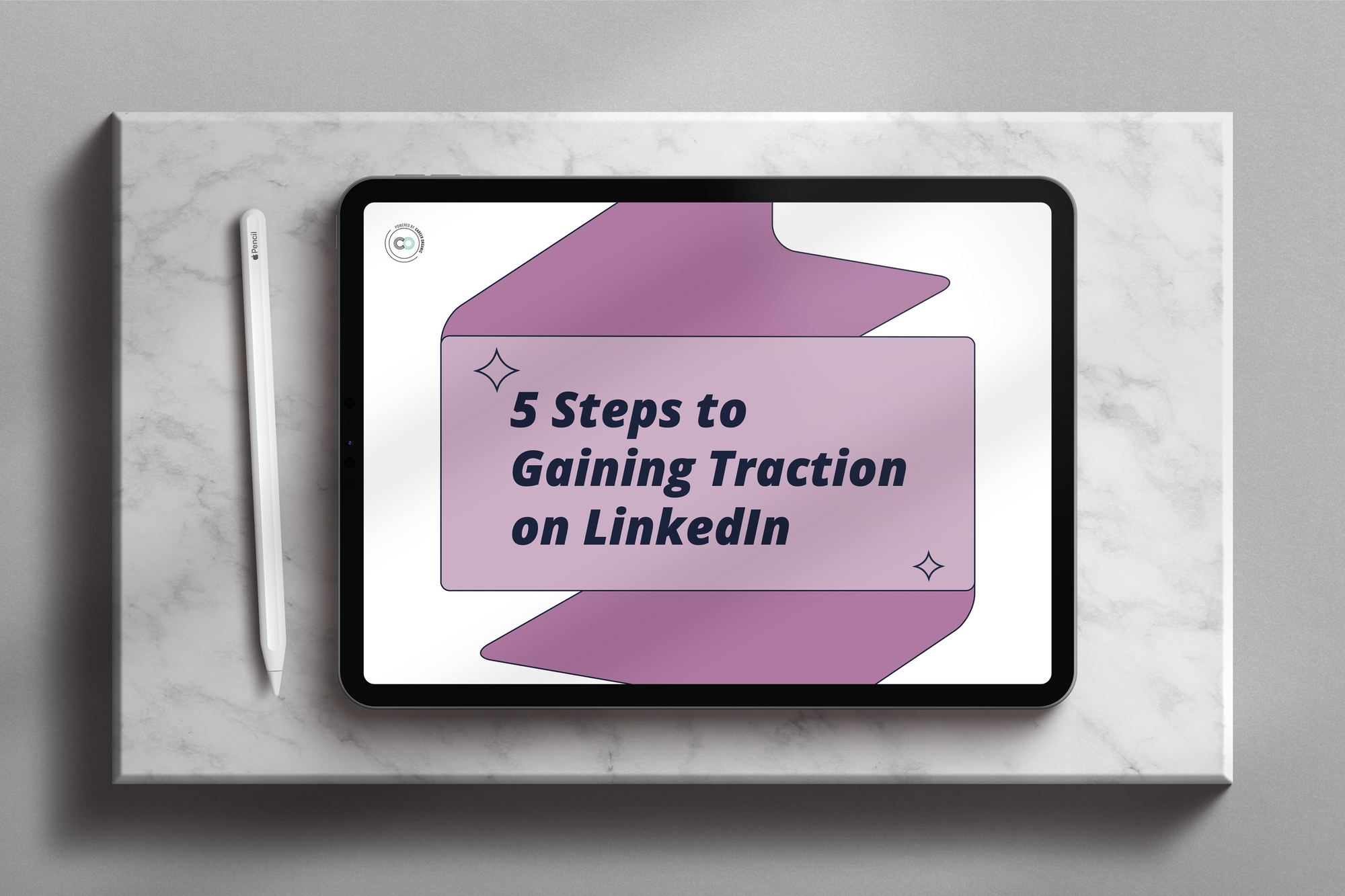 an ipad on a stone background displaying a free resource called 5 steps to gaining traction on linkedin